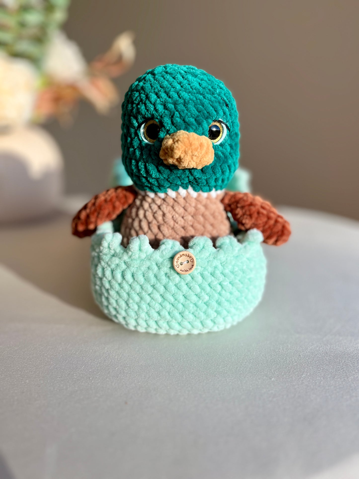 Crochet Duck and its Cozy Shell
