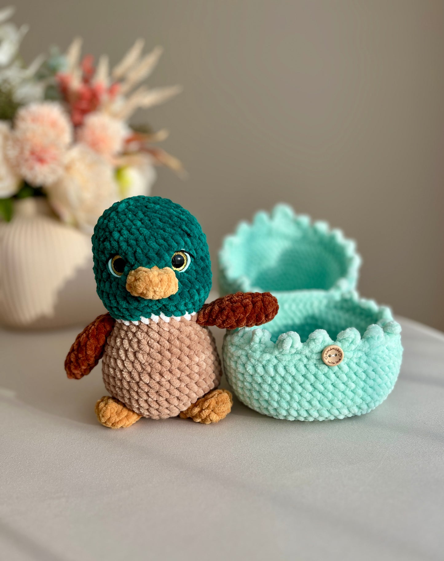 Crochet Duck and its Cozy Shell