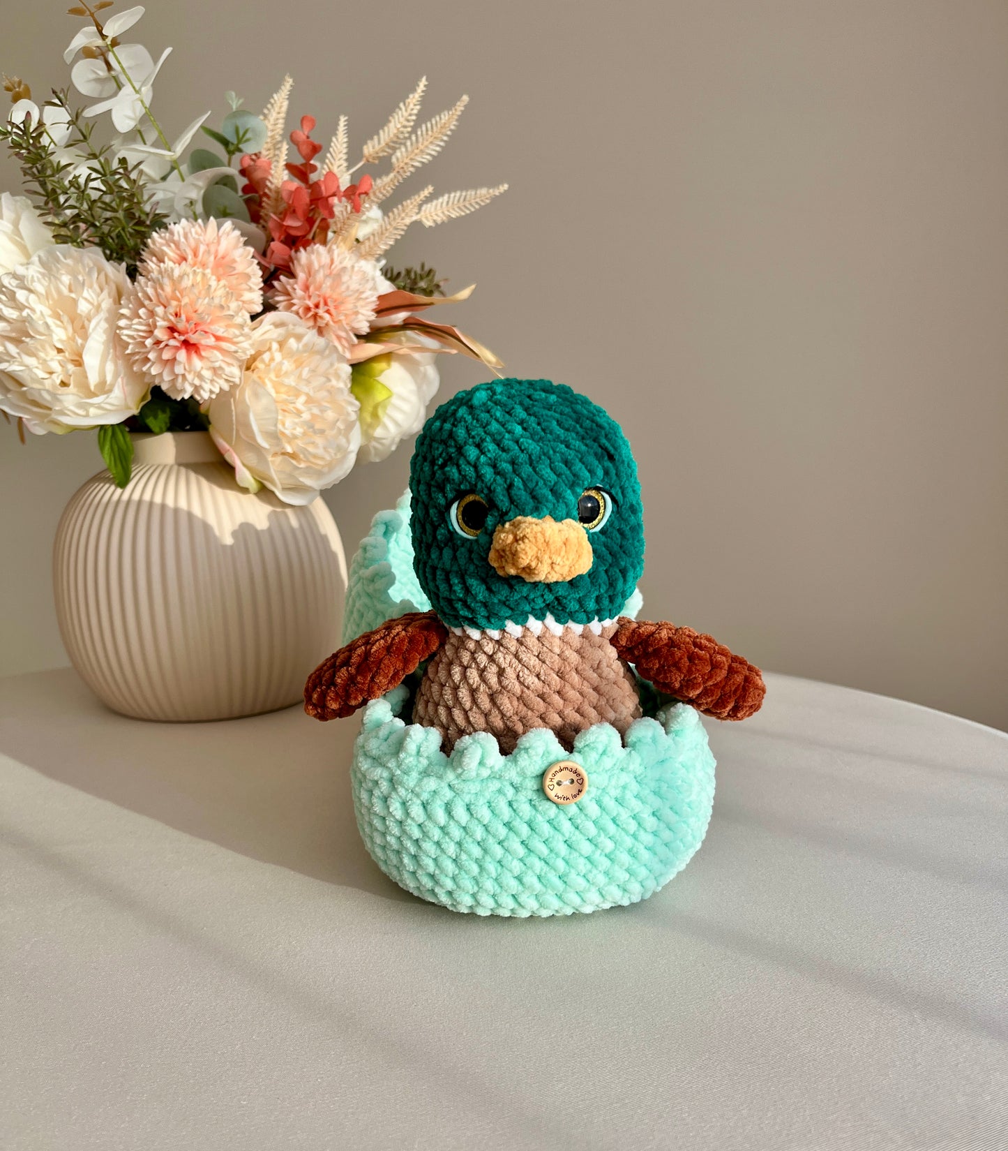 Crochet Duck and its Cozy Shell