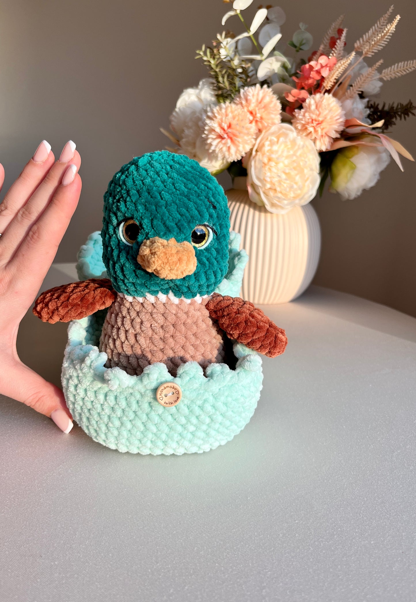 Crochet Duck and its Cozy Shell
